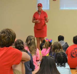 Michelle Speaking To Kids